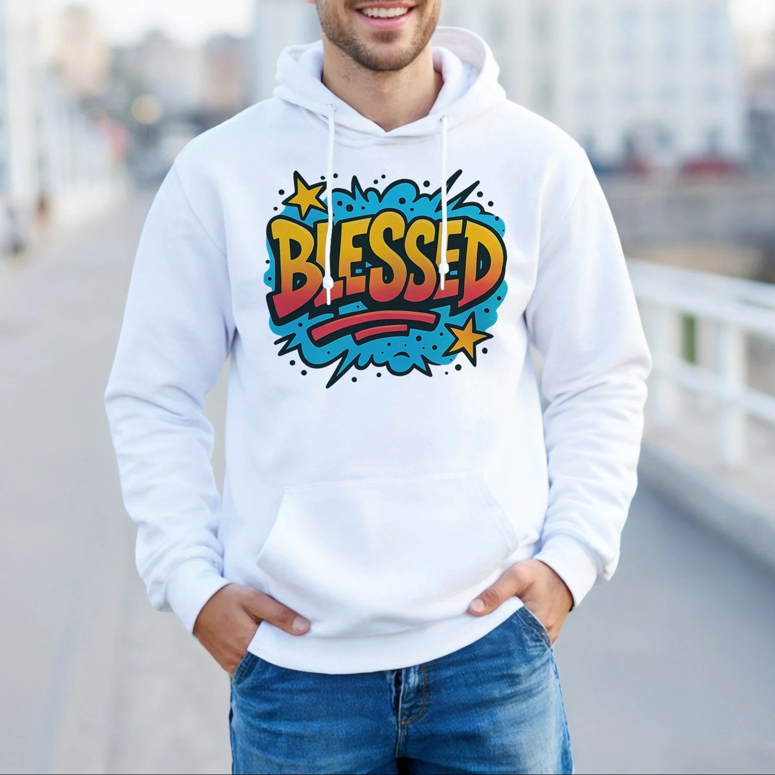 Man wearing a white hoodie with 'Blessed' design outdoors