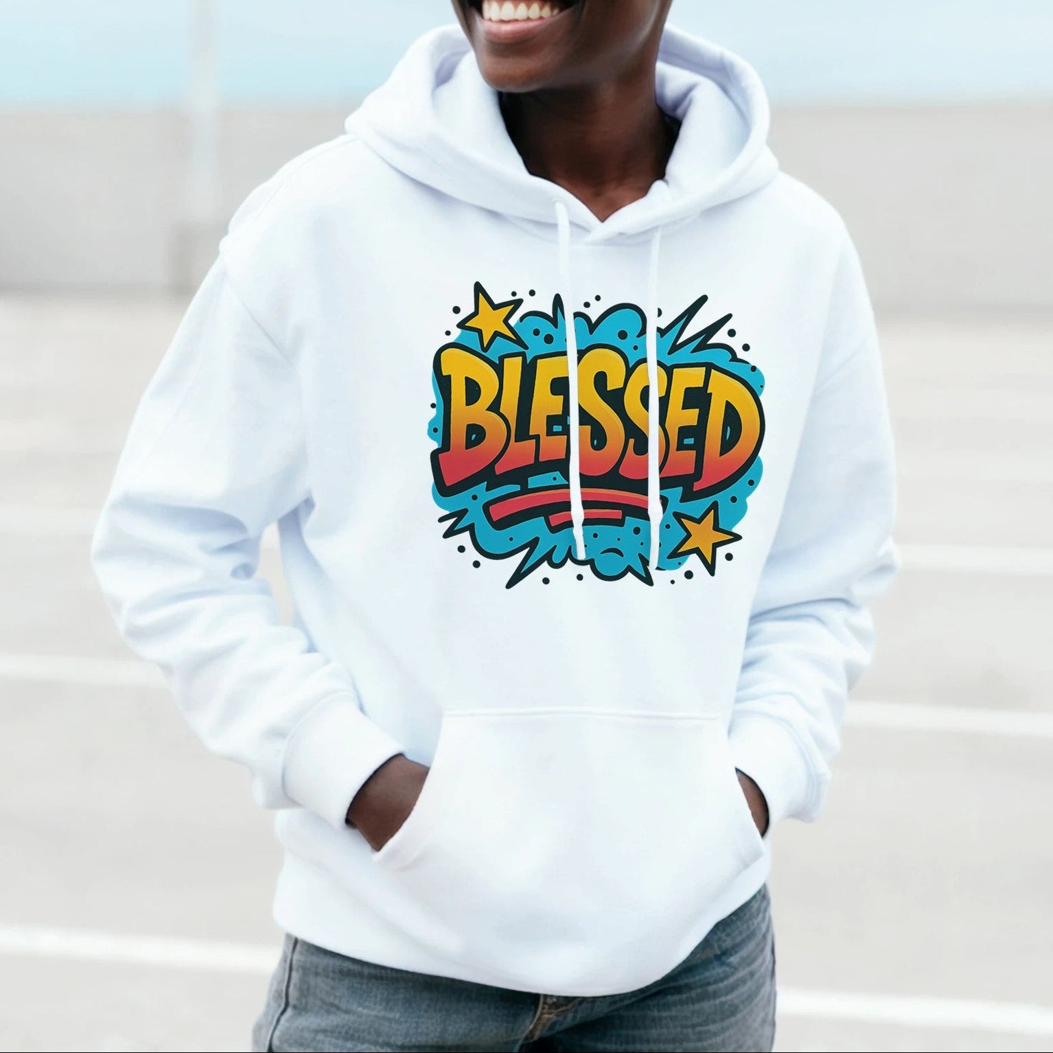 Person wearing a white hoodie with 'Blessed' design outdoors
