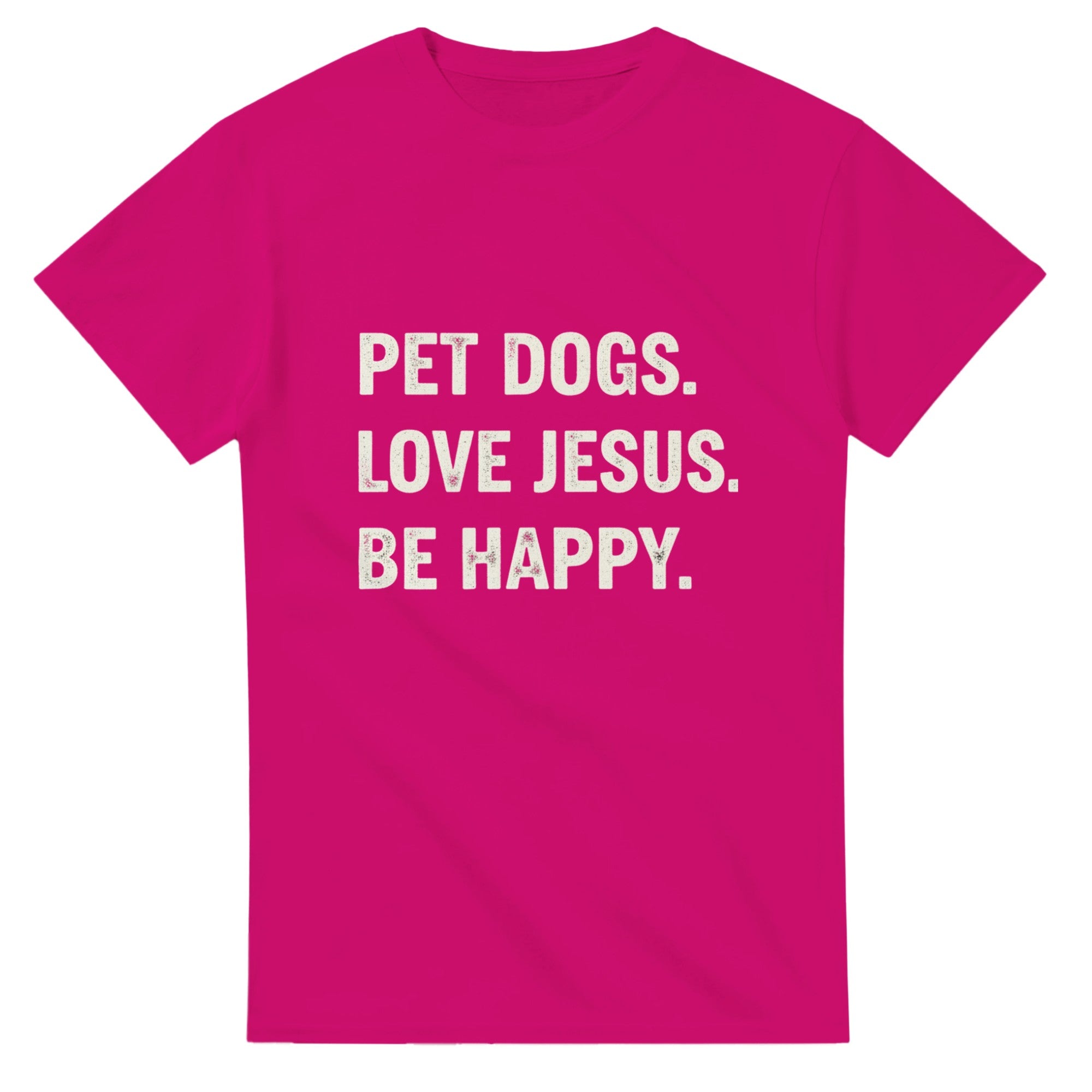 Pink t-shirt with white text 'PET DOGS. LOVE JESUS. BE HAPPY.' on a white background