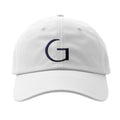 White cap with a black letter 'G' on a white background