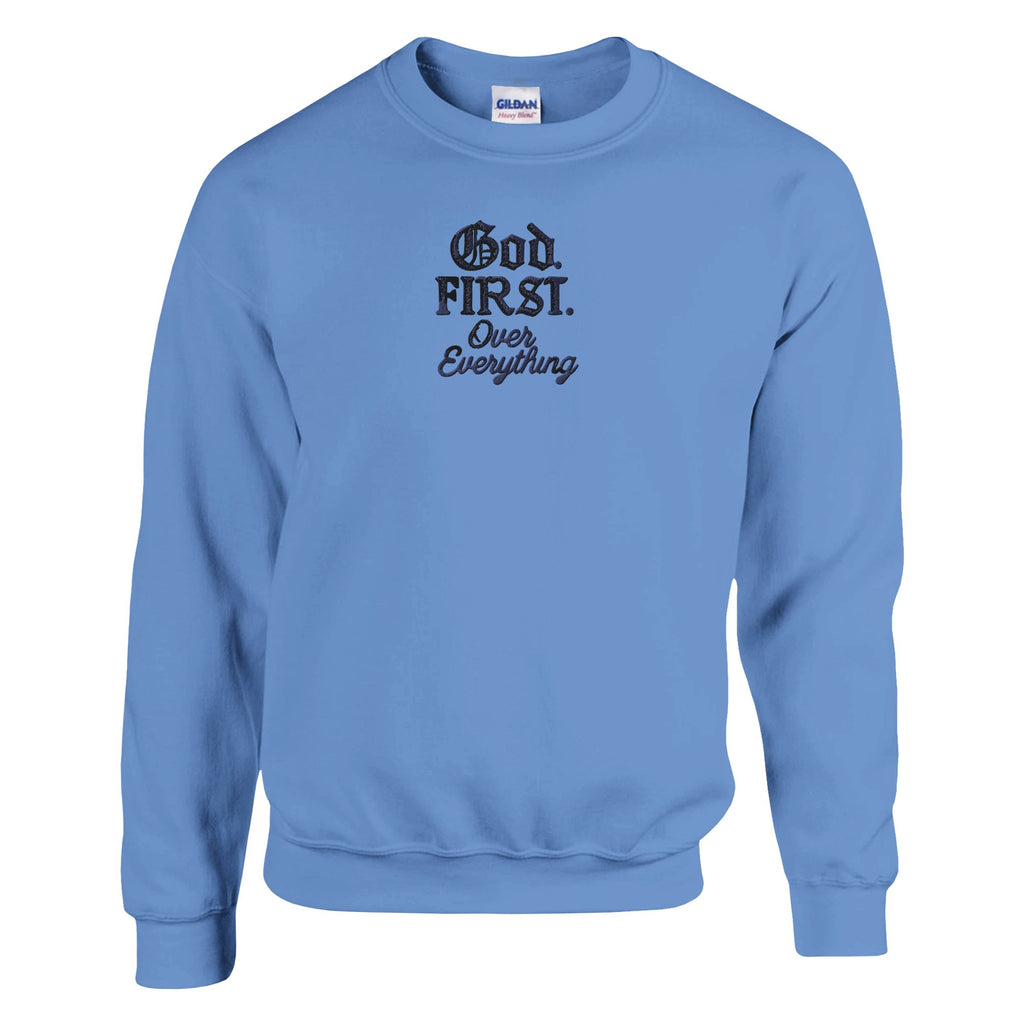 Light blue sweatshirt with text 'God First Over Everything' on a white background