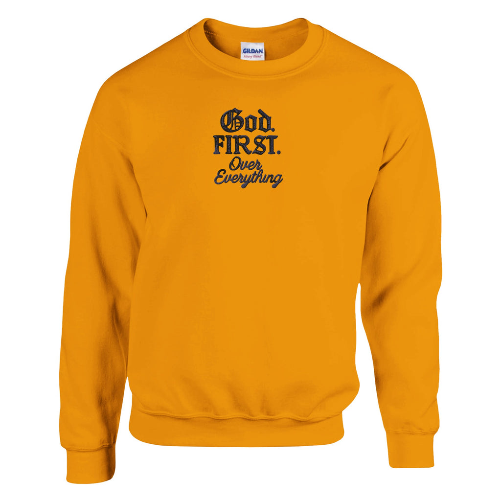 Yellow sweatshirt with text 'God First Over Everything' on a white background