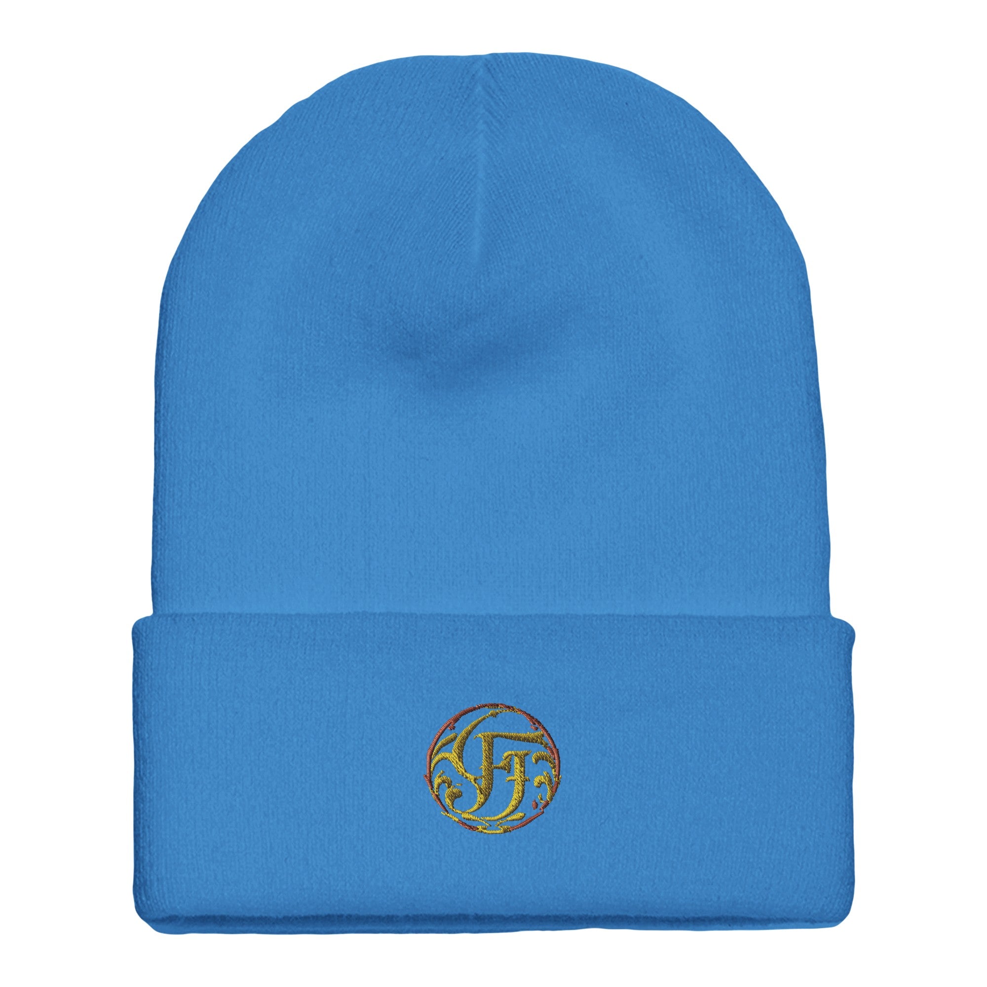 Blue beanie with a logo on the cuff against a white background