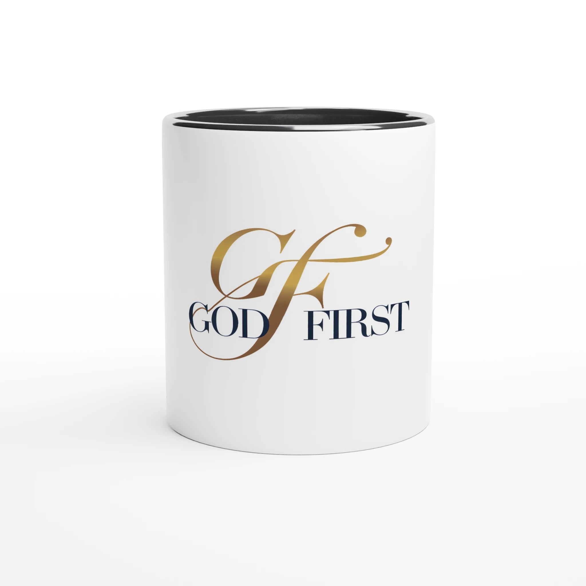 White mug with 'GOD FIRST' text in gold and black on a white background