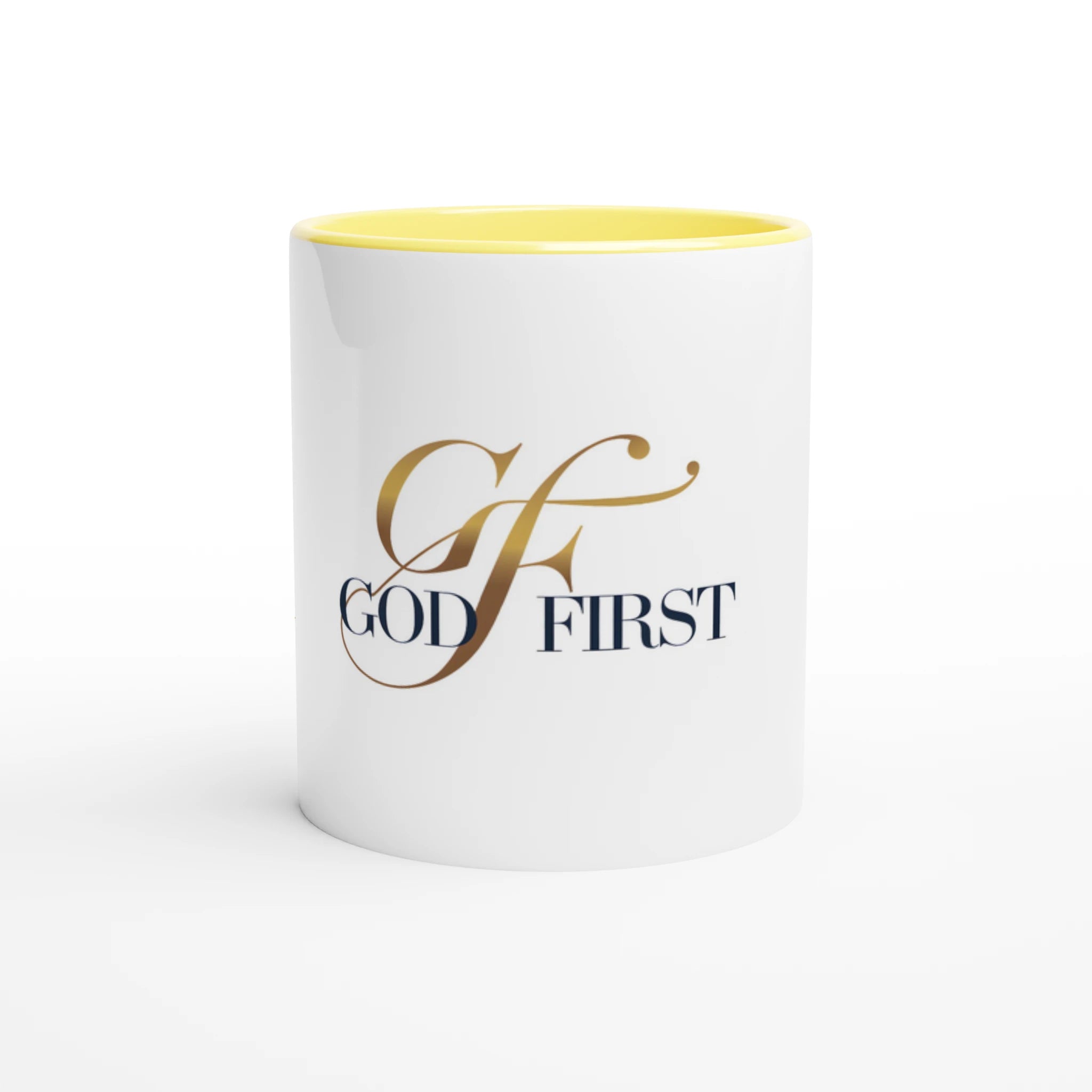 White mug with yellow interior and 'GOD FIRST' text on a white background