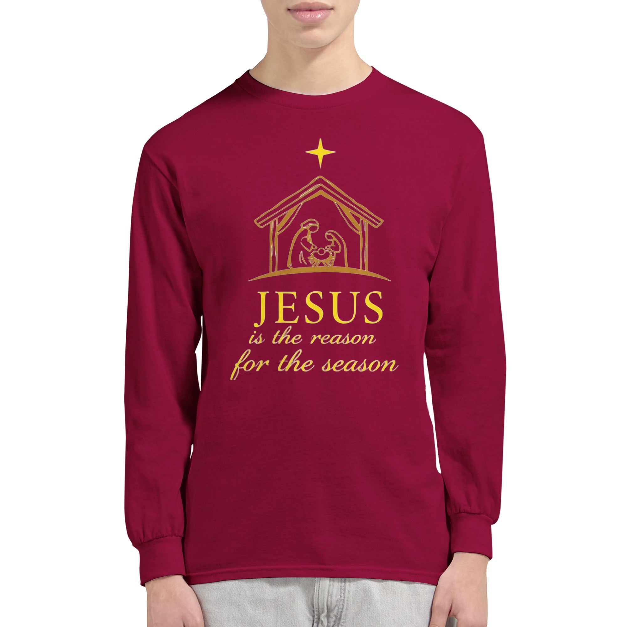 Maroon long-sleeve shirt with gold nativity scene and text design on a white background