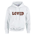 White hoodie with 'LOVED 1 John 4:8' text on a white background