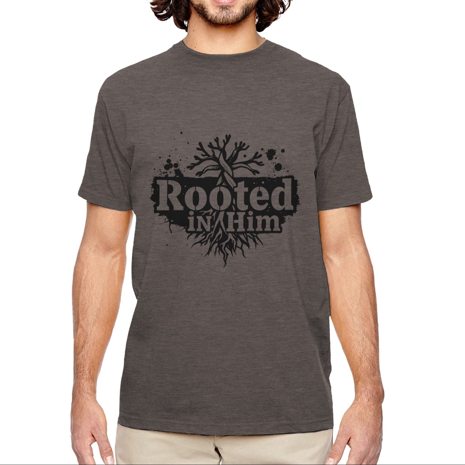 Man wearing a gray t-shirt with 'Rooted in Him' design on a white background